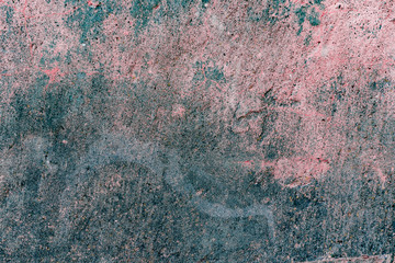 Texture of a concrete wall with cracks and scratches which can be used as a background