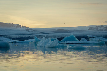 Ice bergs/chunks and glacier at jokulsarlon/fjallsarlon glacier lagoon. Iceland and travel concept.