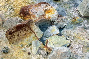 Bubbling hot water from the ground in geothermal area in Iceland. Power, hot, powerful, sulfur, texture concept.