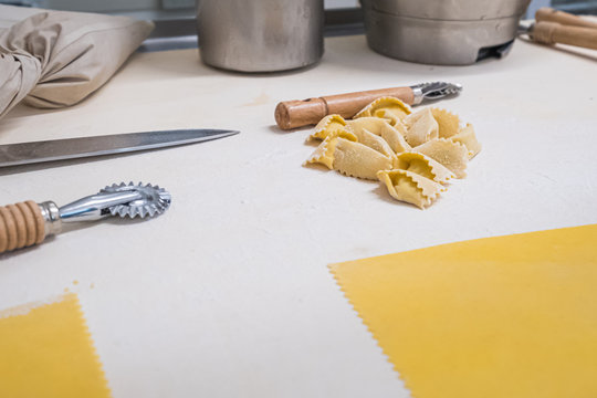 Making homemade traditional egg pasta noodles