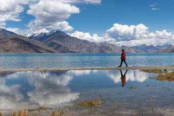 Traveler man enjoy Pangong Lake (Pangong Tso) Merak, Leh, Jammu and Kashmir ,India.
