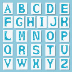 Alphabet letters. Font for winter alphabet decorated with snowflakes. Cartoon flat style. Vector illustration	