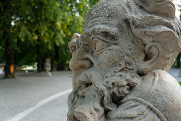 Profile of one of the statues of the Dwarf Garden, near Mirabell Garden in Salzburg