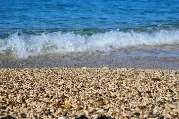 urquoise Ionian Sea water light sand and pebbles on the beach on Lefkada Island, Greece. Beautiful...