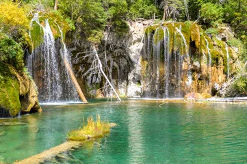 Tableau sur plexiglas Paysages Waterfalls and crystal clear water at Hanging Lake park in Colorado, USA  © andrmoel