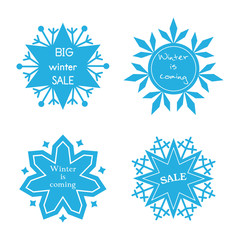 Set of winter emblems in the form of snowflakes.
