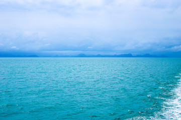 turquoise sea and distant coast