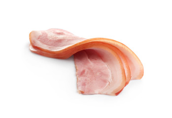 Slices of raw bacon on white background