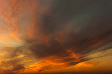 Naklejka na ściany i meble Beautiful sunset sky with amazing colorful clouds.