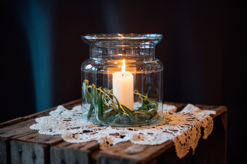 on festive table in wedding banquet. the table is decorated with compositions of greenery