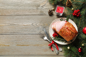 Flat lay composition with delicious ham served on wooden table, space for text. Christmas dinner - Powered by Adobe