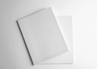 Blank books on white background, top view. Mock up for design