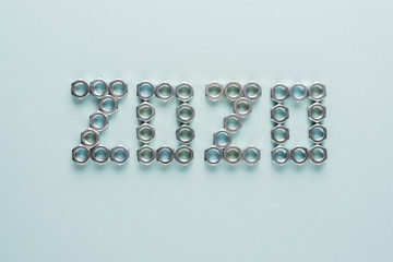 Happy New Year 2020. Metal nuts in the form of numbers.