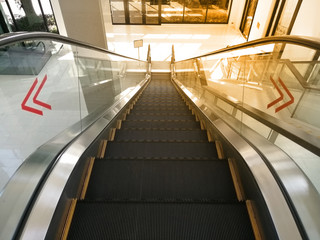 Fototapeta premium Escalators in an office building.