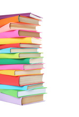 Stack of colorful books on white background