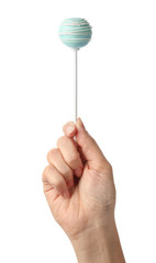Woman holding sweet cake pop on white background, closeup