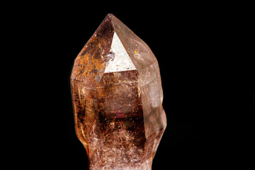 macro mineral stone smoky quartz on a black background