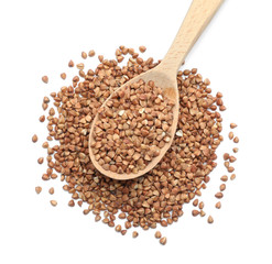 Raw buckwheat grains on white background, top view