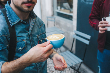 Man with cup of coffee