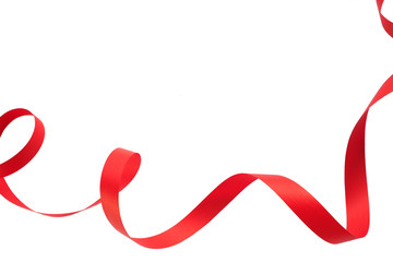 Bright red ribbon isolated on a white background. Copy space.