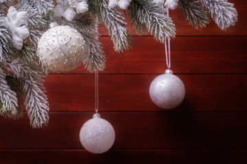Christmas baubles in frosty branches. Xmas and New Year Concept