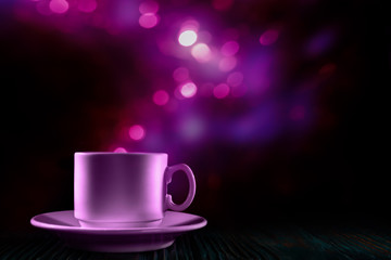 Obraz na płótnie Canvas Magic cup of coffee with violet holiday lights over dark background