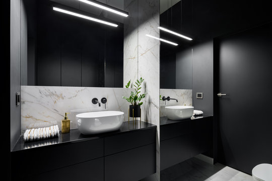 Black Bathroom With Mirror Wall