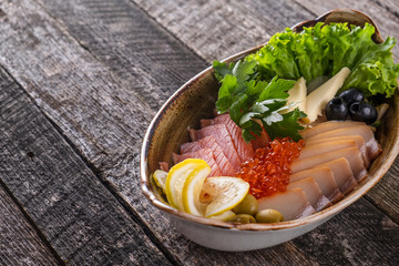 Cold appetizer with salted salmon and halibut with space for text
