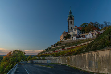 Fototapeta na wymiar Church castle and old houses in old town Melnik in central Bohemia