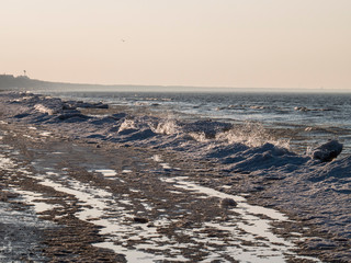 Snow frozen winter sea beach. Winter nature in Baltic countries.