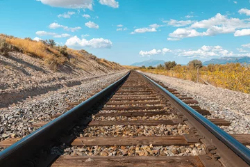 Wall murals Railway Straight railroad track in Utah, USA - the way forward