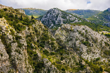 Ancient walls of Kotor Fort (St John Fortress) in the mountains slope of Kotor, Montenegro 