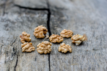 Walnut without shkallupy on a wooden background
