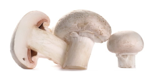 Fototapeta na wymiar Fresh half champignon mushrooms, isolated on white background
