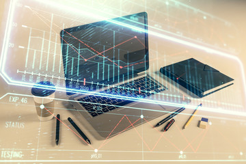 Fototapeta premium Business theme concept hologram with desktop office background. Double exposure.