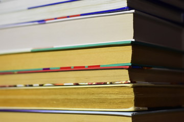 Stack of Used Old Books in the School Library, Toned Cross Processed Image