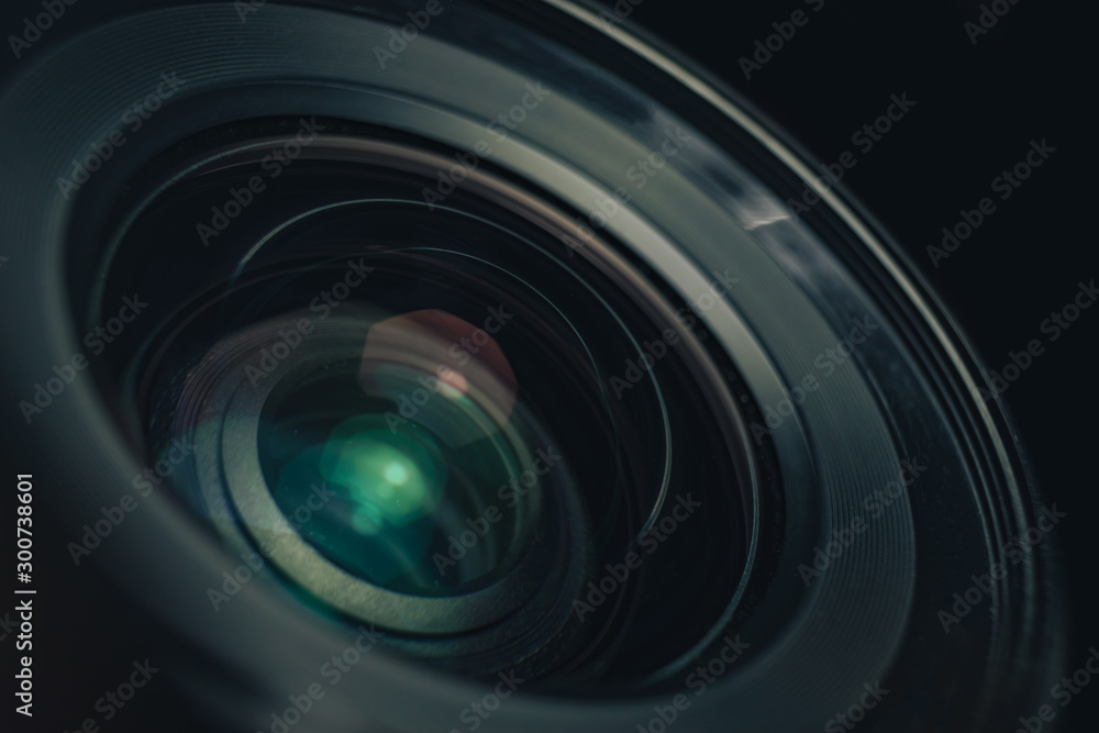 Aufkleber close up beautiful camera lens on a black background. macro view..