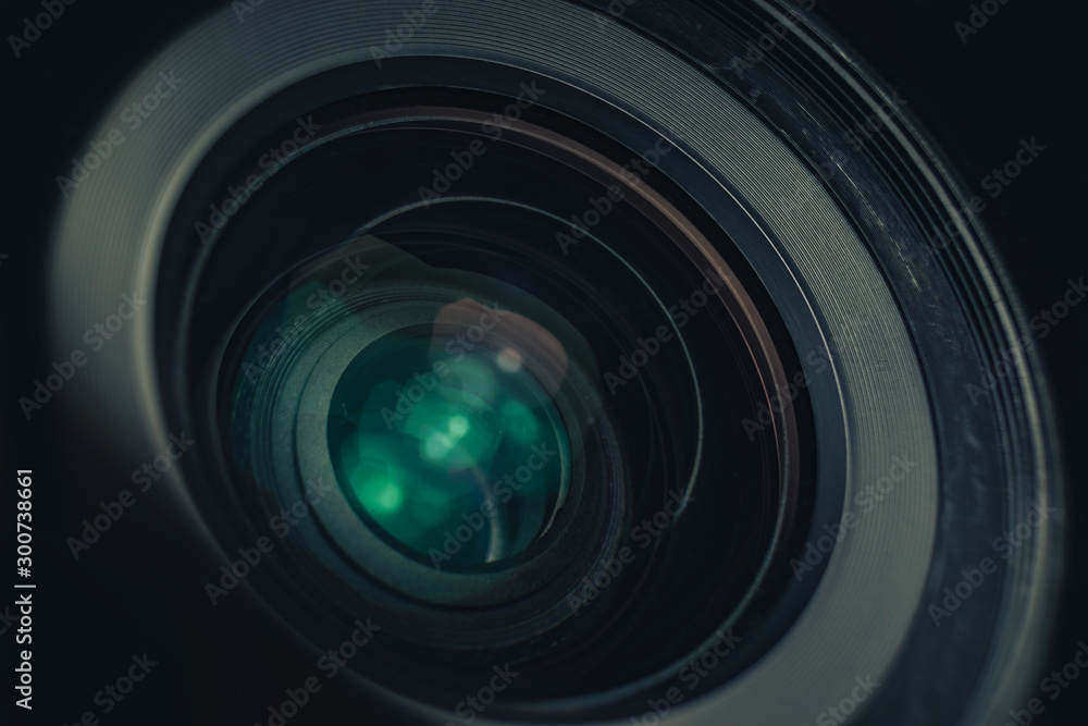 Aufkleber close up beautiful camera lens on a black background. macro view..