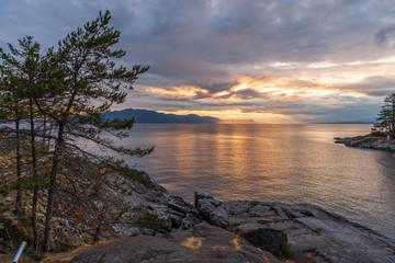 Fototapeta na wymiar Ocean sunset over mountains in beautiful British Columbia. Canada.