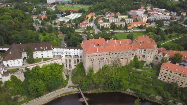 Cesky Krumlov, city in the Czech Republic. View on the river side. View from the dron on the city in the Czech Republic. Beutiful, old city ib the Czech Republic.