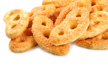 sweet cookies sprinkled with sugar isolated on white background