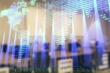 Stock and bond market graph and world map with trading desk bank office interior on background. Multi exposure. Concept of international finance