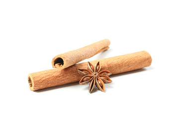 Cinnamon sticks and fragrant anise isolated on white background
