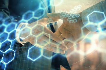 Double exposure of abstract technology drawing on cityscape background with two businessmen handshake. Concept of tech role in business