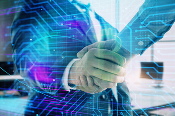 Double exposure of blockchain theme drawing on office background with two businessmen handshake. Concept of crypto economy