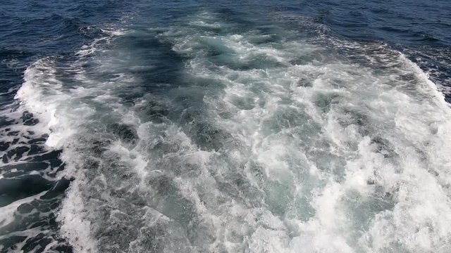Smooth shot of boat wake and waves - seamless looping video.