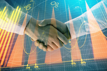 Multi exposure of forex graph on abstract background with two businessmen handshake. Concept of success on stock market