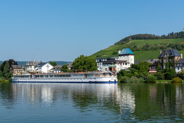 Fototapeta na wymiar View on small German town located in Mosel river valley, quality wine regio in Germany