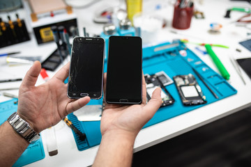 Professional smart phone repair shop or service. Close up shot. Electronics concept.