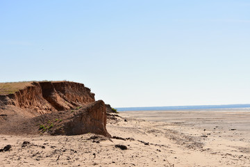 desert landscape with water on the horizon